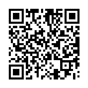 看到邵铭清正认真的看院子里堆砌的山石二维码生成