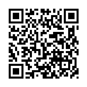 看着雕像下面顶礼膜拜和冥思苦想的信徒们二维码生成