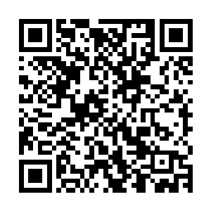看起来竟然与他在世界尽头时见过的那一柄造型上几乎完全一样二维码生成