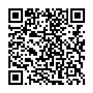 眨眼之间原本一人多高的黑色石头变作一地粉末二维码生成