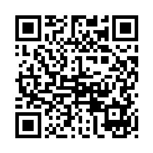 秦总理紧紧地握住了孙正明的手道二维码生成