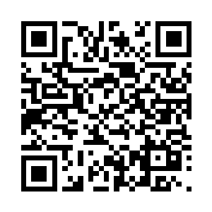 穿着黑色铠甲之人的脸上全都是血迹二维码生成