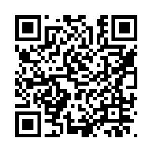 站在人群外围边缘参观这个东方古国的信仰二维码生成