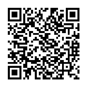 终于在青铜棺椁的一个角落发现了一具焦黑的人影躯体二维码生成