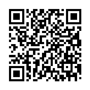 罗杰彷佛是听到了尼尔的话才转头一般二维码生成