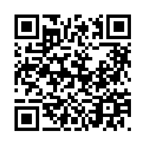 而且他面具上画着许多猩红色的咒符二维码生成