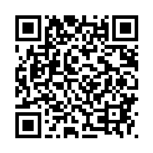 而且在这古董店老板靠近它的时候二维码生成