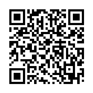 而何玉平正和那几位孔武有力的大汉对峙二维码生成