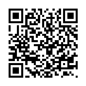 而后随便找了块石头在着高楼的门前不断击打二维码生成