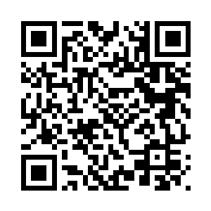 而在右边放着一张床和一个小衣箱二维码生成