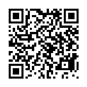 而旁边扎在瓷瓶中的一束蓝色妖姬二维码生成