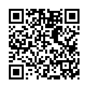 而箭头上边还有几个小小的电子灯闪烁着二维码生成