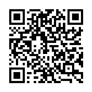 耳朵上面更是戴了两颗巨大的红宝石吊坠二维码生成