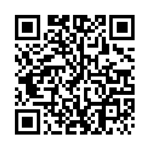 胸前挂着骨质项链表明他的身份较高二维码生成