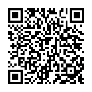 脑海中突然冒出来下午在重庆饭店里看到的那一幕二维码生成