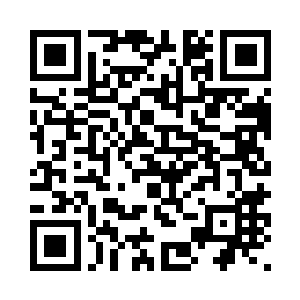 芮炳成端坐在正对着门口的椅子上二维码生成