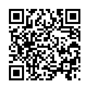 营区主体建筑为一栋两层四翼结构的楼房二维码生成