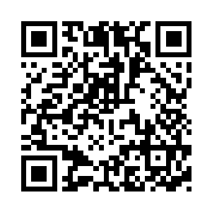 落日的余晖把白雪染成了一片暖黄色二维码生成