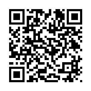 认真无比地听着台上的张蜀生讲课二维码生成