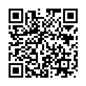 记者看向一直挂着迷人笑容的泽塔二维码生成
