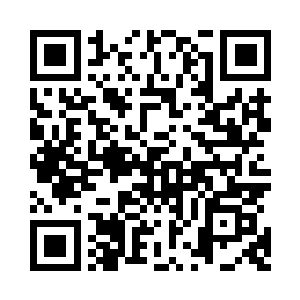 说话的是一名浑身浴血的中年男子二维码生成