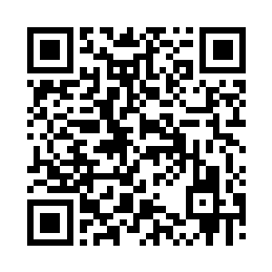 身子后面是堆积如山的文案等着她处理二维码生成