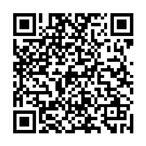 这三人中这个长着满脸胡子的现在只是我们案子的疑犯二维码生成