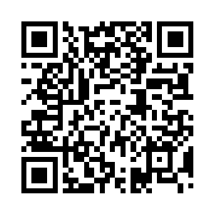 这个一直站在窗户面前的男人才挥了一下手二维码生成