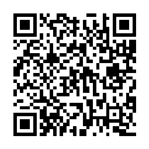 这个女人和之前在铜镜里看见的那个女人竟然一模一样二维码生成