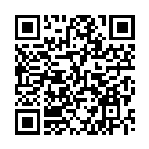 这中年男子就是招待秦宇的彝族主人二维码生成