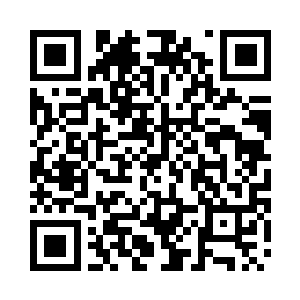 这家伙就是这群食人魔的真正指挥官二维码生成