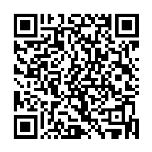 这才用上穿越石消失出现在二十里外的一座高达建筑顶部二维码生成