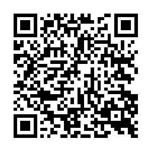 这枚血玉确实是因为被鲜血浸泡后变成了这个样子二维码生成