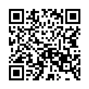 通体漆黑的三足怪鸟屹立在一处高台上二维码生成