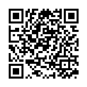 通过远程设备密切的关注着迪拜城中的动静二维码生成