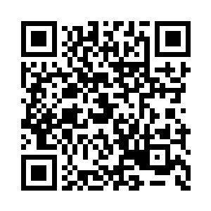 那两位风水相师中的一位认出了这石化重生术二维码生成