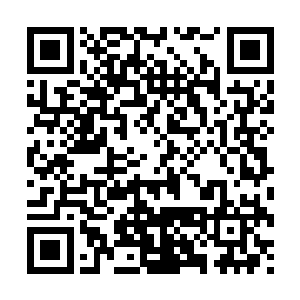 那些坍塌的多米诺骨牌竟然形成了一座非常漂亮的穹隆形建筑二维码生成