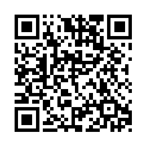 那仅仅露出了半只眼眸的精美巨大浮雕~二维码生成