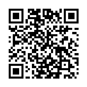 那核弹头周身包裹着一层淡淡的红云二维码生成