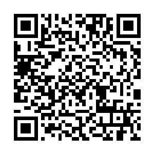 那犹如水波似地空间波纹就是一根根不停颤动的琴弦二维码生成