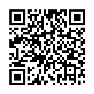 那辆被撞得七零八落的奥迪车也跟了上来二维码生成