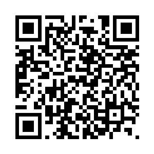 邪飞身边一个巨大的头骨上符文流转二维码生成