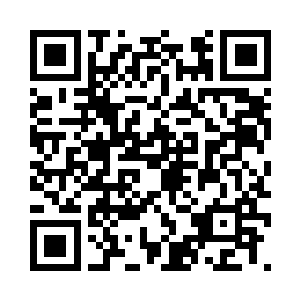 门口站着几个穿着荆棘花标示防护衣的觉醒者二维码生成