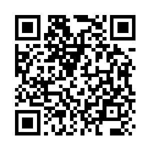 门外的阳光将她的影子长长地投射在地面之上二维码生成