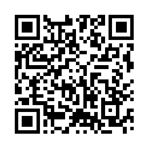 陆为民和章明泉走进县委县府的宿舍区二维码生成