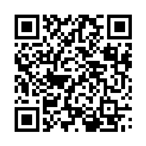 陈离江就被关在其中一辆警车的后座里二维码生成