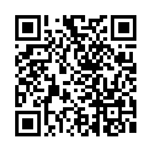 隆隆的破吉普飞驰在霓虹闪烁的城市中二维码生成