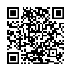 露出了一个白袍老者盘膝端坐在一张二维码生成