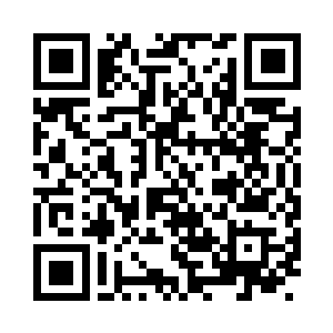 靠里面墙壁有一半的位置都堆满了翡翠毛料二维码生成