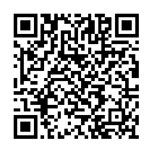 面上涂着的彩泥也没能完全将露出的图腾纹遮掩二维码生成